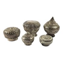 A COLLECTION OF FIVE LATE 19TH/EARLY 20TH CENTURY INDIAN CHASED & REPOUSSÉ SILVER LIDDED BOXES