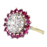 A LARGE 18CT YELLOW GOLD, DIAMOND AND RUBY CLUSTER RING, HALLMARKED LONDON, 1966 Having central