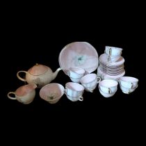 SUSIE COOPER, A MID CENTURY ' CLEMATIS' PORCELAIN TEA SET Comprising a teapot, twelve cups and