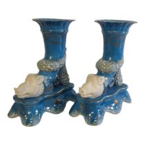 A PAIR OF 19TH CENTURY STYLE LIGHT BLUE CERAMIC CORNUCOPIA VASES The body ornamentally dressed