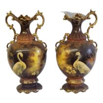 A PAIR OF EDWARDIAN STAFFORDSHIRE ORIENTAL STORK PATTERN TWIN HANDLED POTTERY VASES Both painted