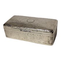 A VICTORIAN ARTS AND CRAFTS SILVER RECTANGULAR CIGARETTE BOX With planished finish and wooden