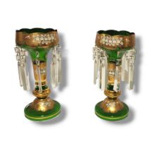 A LARGE PAIR 19TH CENTURY BOHEMIAN GREEN GLASS LUSTRE VASES Having overlaid gilt decoration with