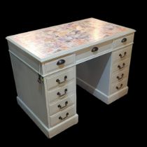 AN EDWARDIAN PAINTED PINE KNEEHOLE DESK Three drawers over two banks of four drawers, set with