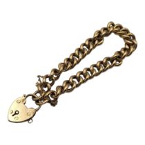 A LATE 19TH/EARLY 20TH CENTURY CURB LINK BRACELET Having a heart form lock/clasp. (approx 20cm)
