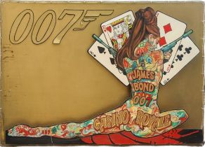 A LARGE HAND PAINTED WOODEN THEATRE PROP SIGN FOR JAMES BOND ‘CASINO ROYALE’, 1967 Ursula Andress in