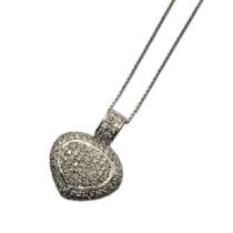 AN 18CT WHITE GOLD AND DIAMOND HEART PENDANT NECKLACE Having pavé set diamonds in a hollow pierced