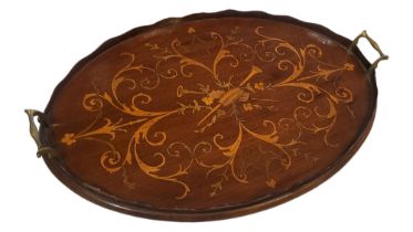 AN EDWARDIAN INLAID MAHOGANY BUTLAR'S TRAY Twin brass handles with inlaid decoration of trumpets and