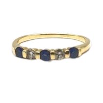 A VINTAGE 14CT GOLD, SAPPHIRE AND DIAMOND THREE STONE RING Having a row of round cut sapphires