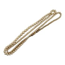 A VINTAGE 9CT GOLD AND FAUX PEARL NECKLACE The rectangular clasp with a graduated