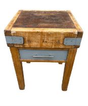 A 20TH CENTURY SOLID BEECHWOOD BUTCHER’S BLOCK On stand, with fitted drawer on square legs with