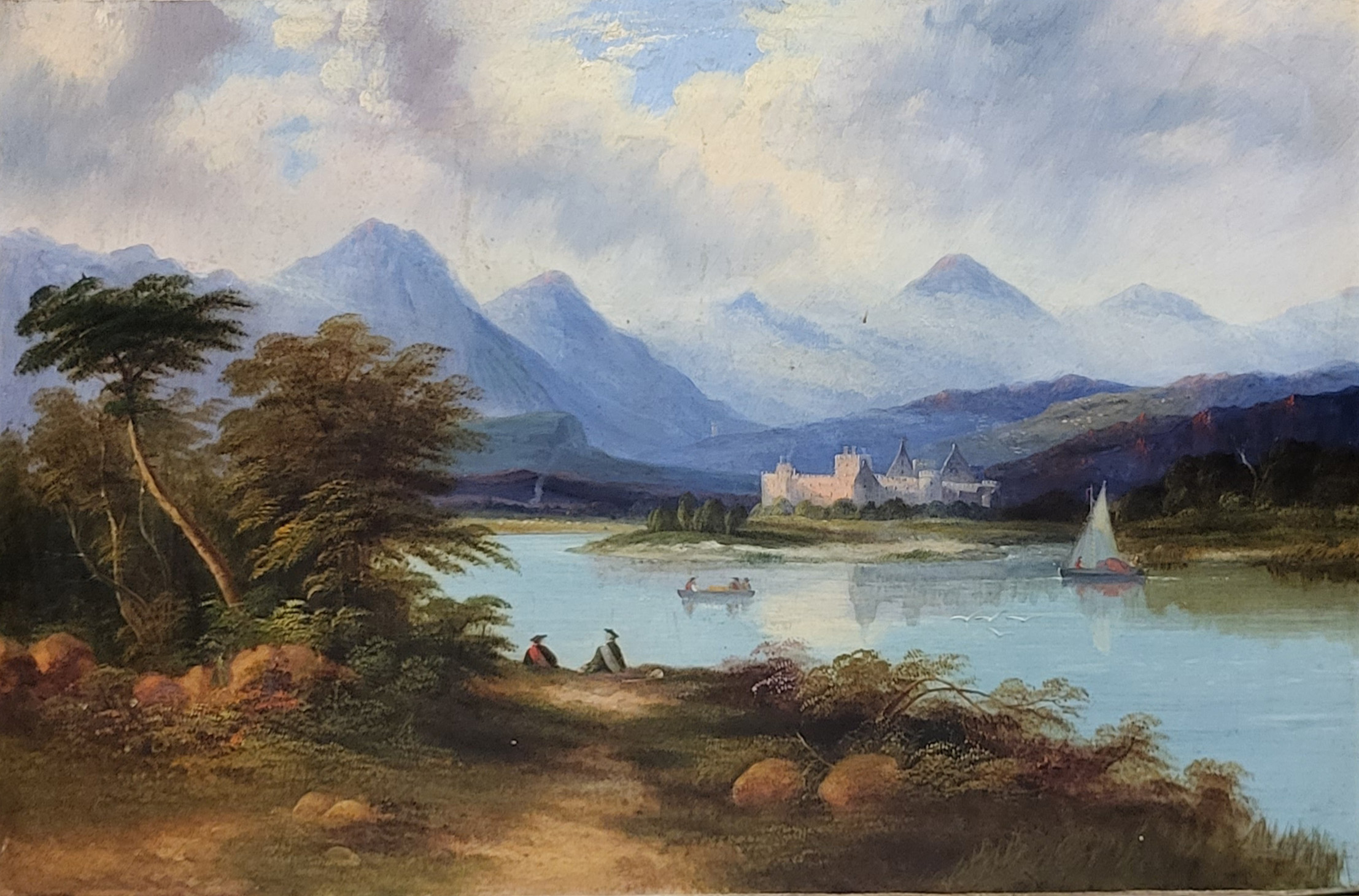 A 19TH CENTURY OIL ON CANVAS, SAILING BOATS ON A SCOTTISH LOCH With castle and mountains beyond,