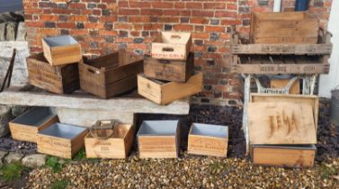 A COLLECTION OF TWENTY VINTAGE AND LATER WOODEN CRATES Bearing various bandings. (largest 55cm x