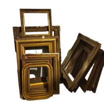 A COLLECTION OF TWELVE 19TH CENTURY AND LATER CARVED GILDED PICTURE FRAMES To include two cushion