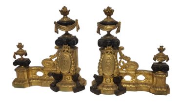 A PAIR OF FRENCH 19TH CENTURY GILT BRONZE CHENETS Classical form with urn finials and figural