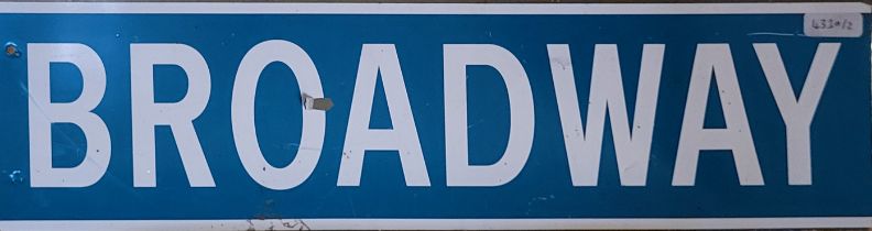 A METAL THEATRE PROP DOUBLE SIDED ‘BROADWAY’ STREET SIGN. (w 47cm x h 12.5cm) Condition: good