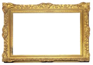 A 20TH CENTURY GILDED RECTANGULAR PICTURE FRAME With carved scrolled decoration. (aperture approx