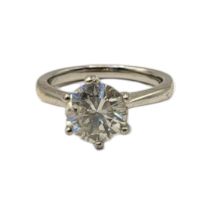 A VINTAGE PLATINUM AND DIAMOND SOLITAIRE RING Set with a single round cut diamond in a plain