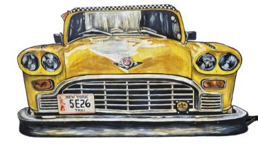 A LARGE CONTEMPORARY HAND PAINTED WOODEN THEATRE PROP ILLUSTRATION OF A NYC YELLOW CAB. (w 220cm x h