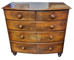 A VICTORIAN MAHOGANY BOW FRONTED CHEST Of two short above three long drawers. (111cm x 56cm x 107cm)