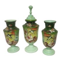 A VICTORIAN OPALINE GLASS GARNITURE SET The central vase and cover hand painted with flower and