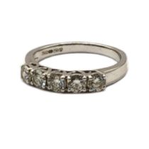 AN 18CT WHITE GOLD AND DIAMOND FIVE STONE RING Having a row of round cut stones. (approx 0.5ct total