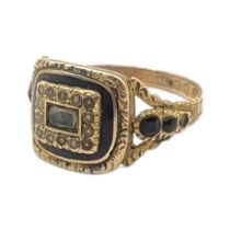 A LATE VICTORIAN 9CT GOLD GENT’S MOURNING RING Set with black enamel inscribed inside ‘Father Nov.