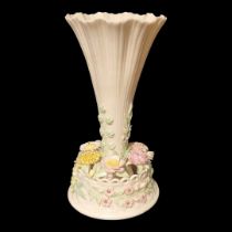 BELLEEK, A 20TH CENTURY IRISH PORCELAIN TRUMPET VASE The central reeded trumpet with applied