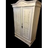 A DUTCH PAINTED PINE FLAT PACK DOUBLE WARDROBE With fielded panelled doors above a single drawer. (