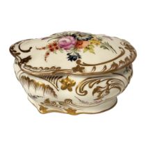 AN EARLY 20TH CENTURY CONTINENTAL PORCELAIN BOX AND COVER Rococo form, with fine hand painted floral
