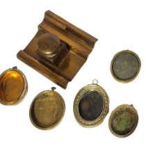 A COLLECTION OF SIX 19TH CENTURY BRASS OVAL PORTRAIT FRAMES Two with engraved decoration,together