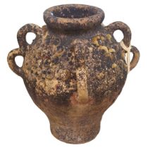 A 20TH CENTURY ROMAN AMPHORA STYLE FONT HANDLED TERRACOTTA GARDEN VASE. (h 53cm)