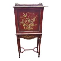 A MID 20TH CENTURY RED LACQUERED AND GILTWOOD CHINOISERIE STYLE JAPANNED SECRETAIRE CABINET ON STAND