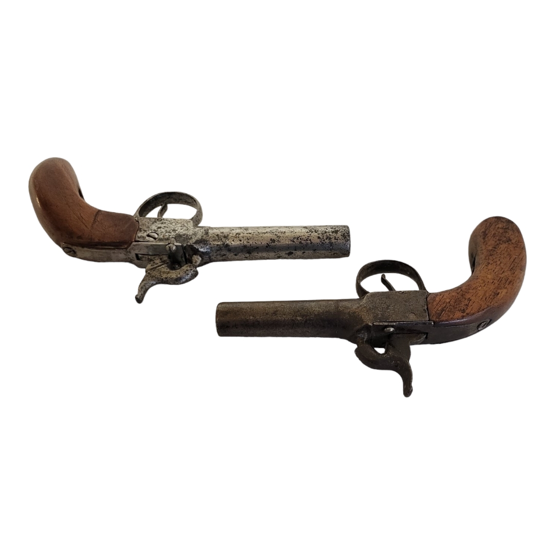 TWO LATE 18TH/EARLY 19TH CENTURY PERCUSSION CAP PISTOLS Having steel barrels and carved wooden - Image 2 of 4