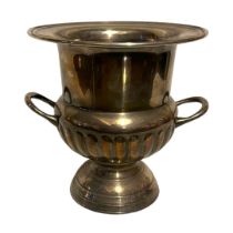 A 20TH CENTURY SILVER PLATED CHAMPAGNE BUCKET Twin handled with flutes to base. (approx 28cm)