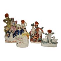 A VICTORIAN STAFFORDSHIRE GUARDIAN ANGEL AND TWO SLEEPING CHILDREN FIGURAL SPILL VASE A