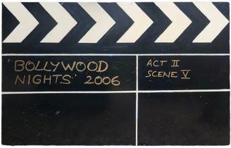 A LARGE HAND PAINTED WOODEN THEATRE PROP CLAPPERBOARD, ‘Bollywood’ written in gold font. Double