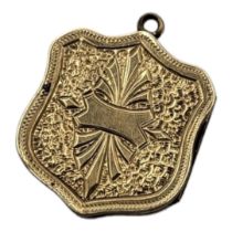 A VICTORIAN GILT METAL AND HARDSTONE PENDANT LOCKET Shield form with engraved decoration and