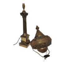 A 20TH CENTURY INDIAN BRASS HANGING TEMPLE LANTERN Having a pierced domed top and applied glass