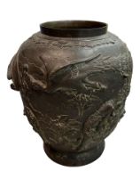 A LARGE 19TH CENTURY JAPANESE BRONZE VASE Decorated with Komainu lion dogs and phoenixes amongst