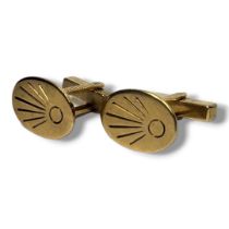 A PAIR OF VINTAGE YELLOW METAL OVAL CUFFLINKS, YELLOW METAL TESTED AS 9CT YELLOW GOLD. (17mm x