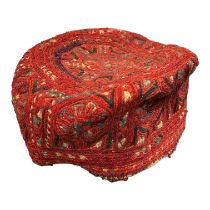 A LATE 19TH/EARLY 20TH CENTURY ISLAMIC KUFI PRAYER CUP Having hand woven geometric decoration. (