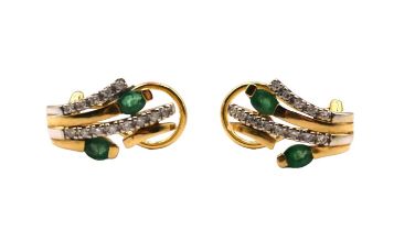 A PAIR OF 18CT YELLOW AND WHITE GOLD, DIAMOND AND EMERALD EARRINGS Each having two oval cut emeralds