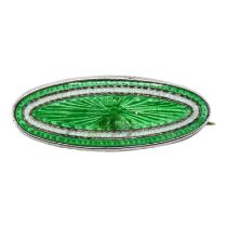 SUFFRAGETTE INTEREST, AN EARLY 20TH CENTURY SUFFRAGETTE SILVER ENAMEL OVAL BROOCH Having green