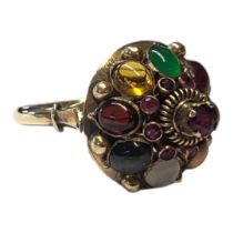 A VINTAGE 14CT GOLD AND MULTI GEM SET TUTTI FRUTTI RING Having an arrangement of cabochon cut stones