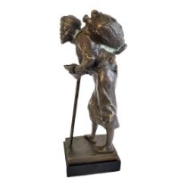 A BRONZE STATUE OF A MIDDLE EASTERN WATER CARRIER On a black marble base. (w 9cmx d 8cm x h 24cm)