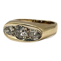 A VINTAGE 9CT GOLD AND DIAMOND THREE STONE RING The central round cut diamond flanked by two marquis