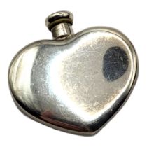 TIFFANY AND CO., A VINTAGE STERLING SILVER SCENT BOTTLE Heart form with screw cap, in a velvet