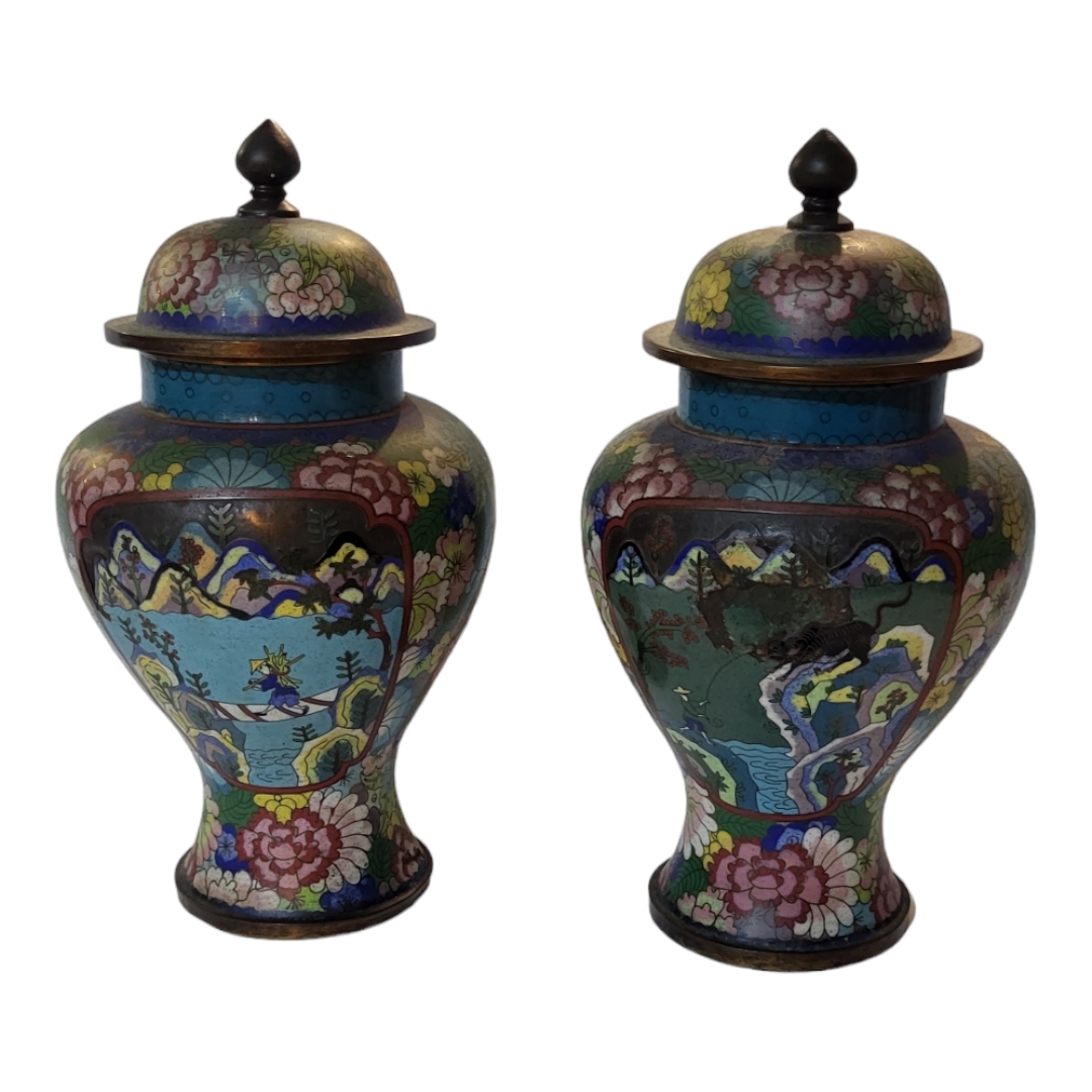 A PAIR OF LATE 19TH/EARLY 20TH CENTURY CHINESE CLOISONNÉ VASE AND COVERS Decorated with mountain