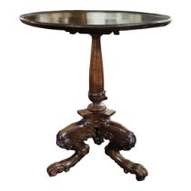 AN EARLY 19TH CENTURY SOLID MAHOGANY TILT TOP OCCASIONAL TABLE, the circular dish top raised